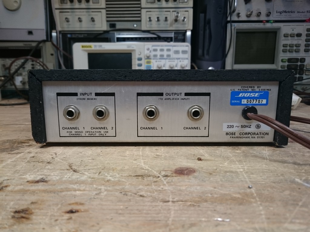 A rear view, common to both types of the 800 equalizer, showing quarter inch input and output jacks common on professional audio systems.