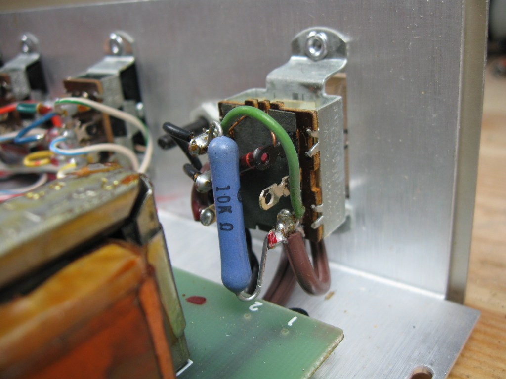 A different view of the rear of the power switch inside the equalizer, showing a different 10K Ohm 5W resistor used to run the unit on 240V power.