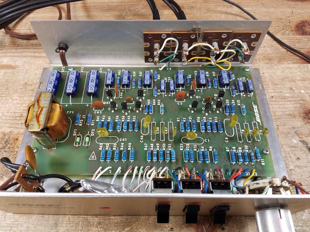 An interior view of a Series 2 equalizer with all components replaced in neat rows.