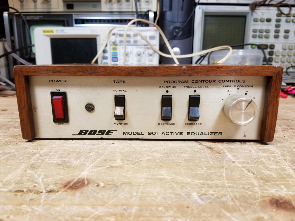A Series 1 equalizer with a large red and black power switch in place of the original clear plastic switch, with an obviously different and clashing visual style.