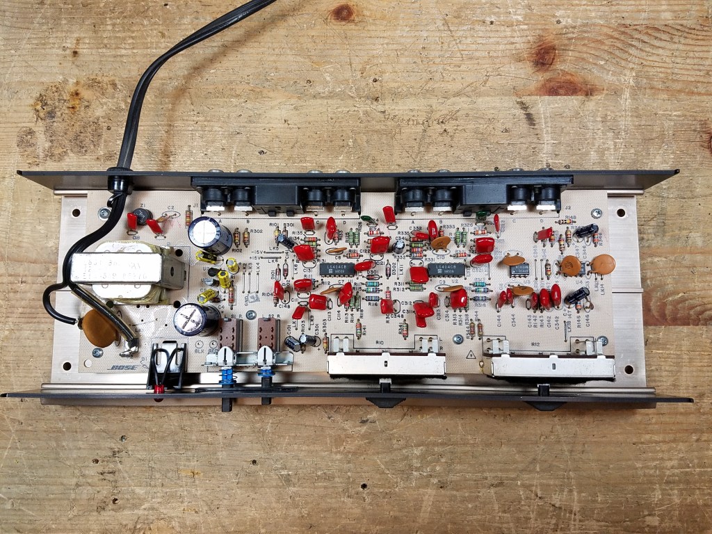 Top down interior view of the 901 Series V Active Equalizer on the repair bench removed from its case, showing original components.