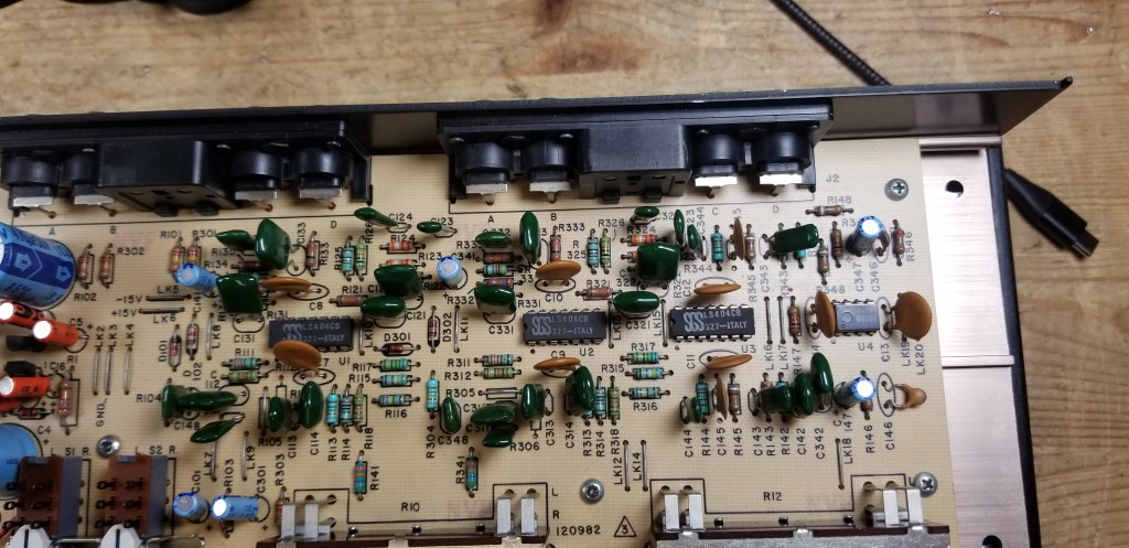 Top down interior view of the 901 Series V Active Equalizer on the repair bench showing a close-up view of the LS 404CB op-amps which need to be replaced.